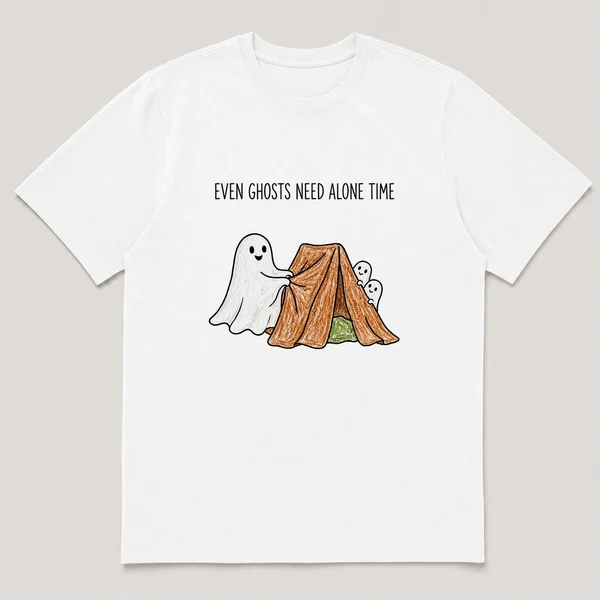 Front view of a White Tee printed with sheet ghost pulls a blanket fort closed while two smaller ghosts peer in and the caption EVEN GHOSTS NEED ALONE TIME